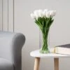 Artificial White Tulips In Glass Vase